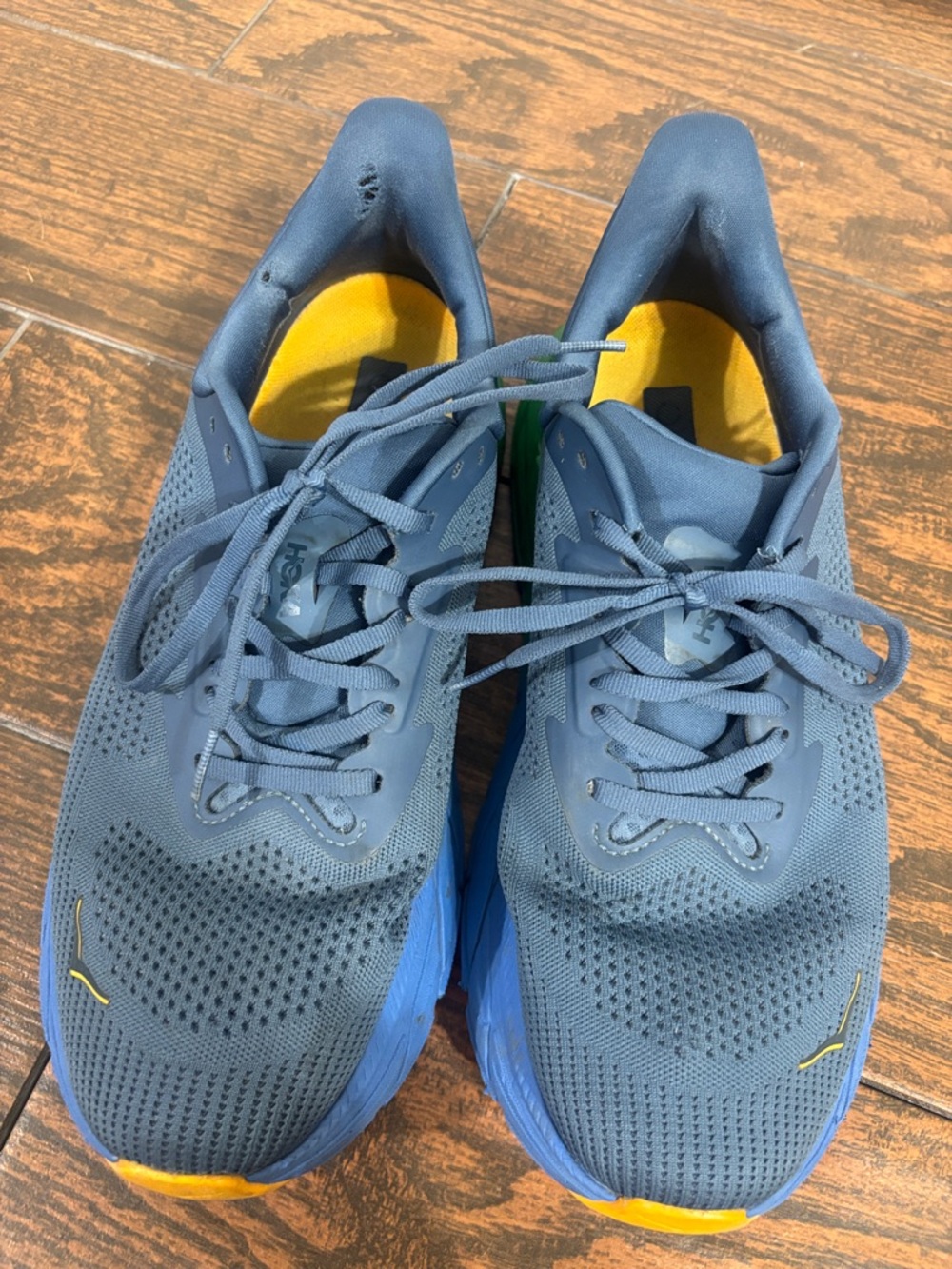 Hoka Men's Slate Blue Athletic Shoes with orange Lining